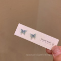 Shangjie OEM Pendientes de mariposa fresca y salvaje de verano para mujeres 2020 Pendientes de la tarjeta de exhibición de aretes coreanos Pendientes de arco